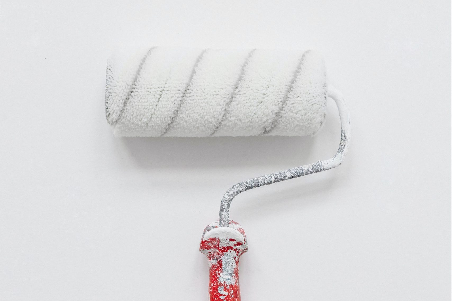 Paint roller with white paint
